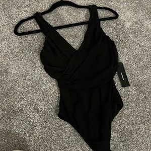 Black tank top body suit. Size: XS. Brand: lulus. Good condition. Worn once